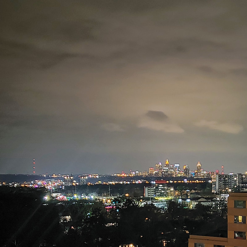 evening skyline of midtown Atlanta taken from the Intercontinental Buckhead Atlanta