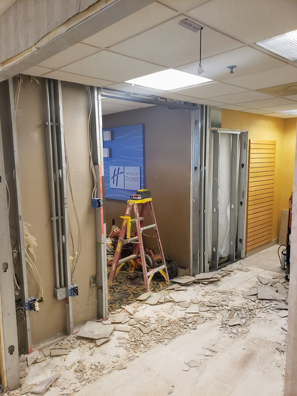 Picture of the renovations at the Holiday Inn Express & Suites Ocean City showing the lobby store under renovations