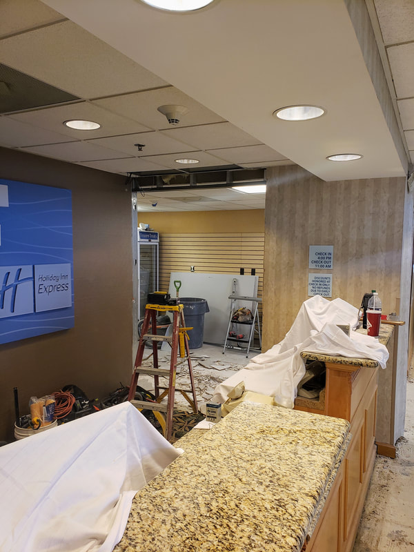Picture of the renovations at the Holiday Inn Express & Suites Ocean City showing the front desk renovations