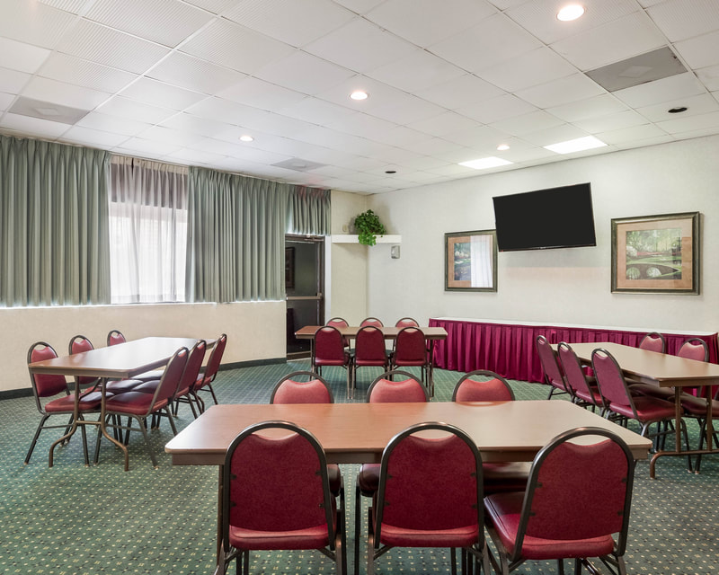 a picture of the meeting space set up for a meeting at the comfort inn gold coast in ocean city, md